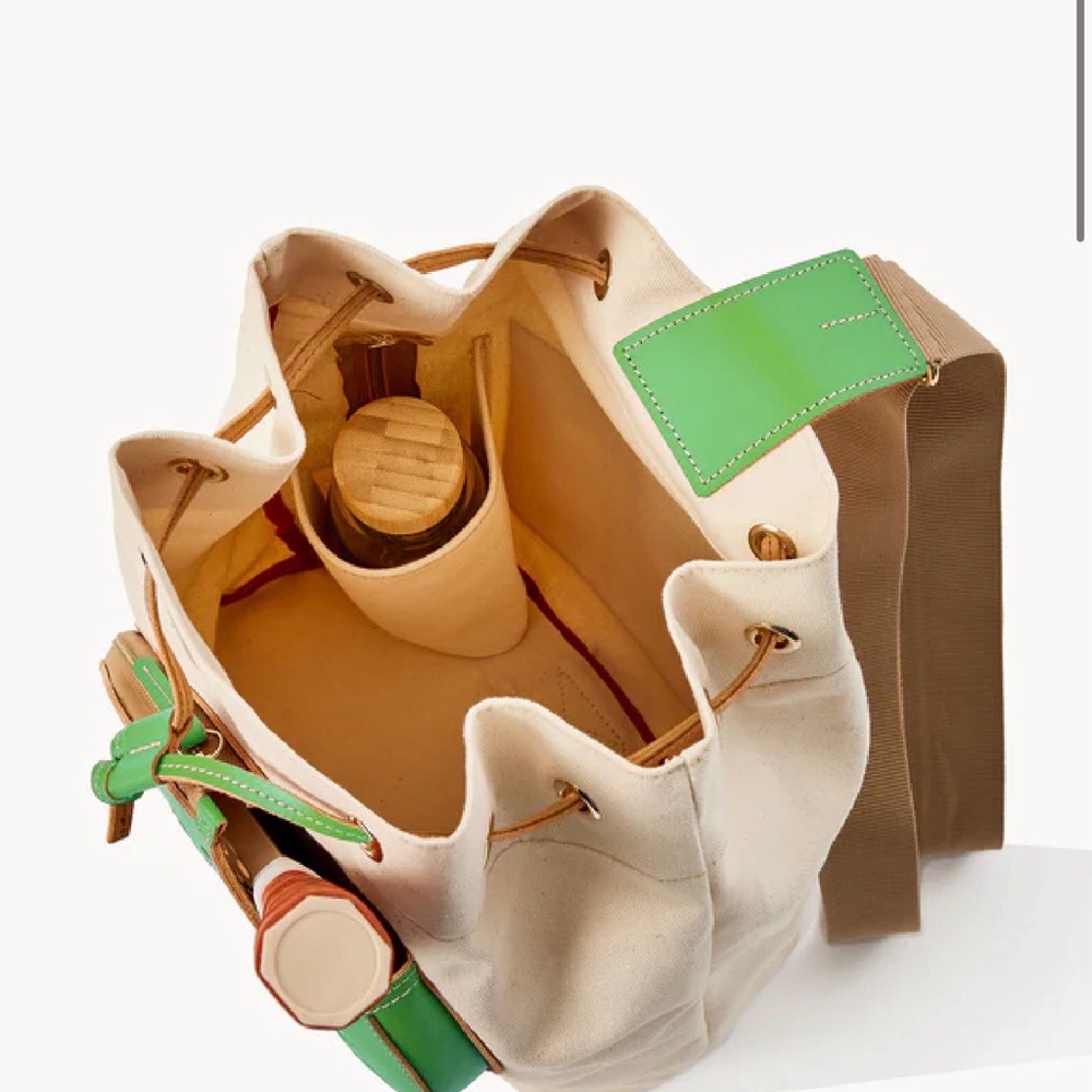 Dooney & Bourke Cream Canvas Drawstring Tote with Green Paddle Pocket - Picture 2 of 7
